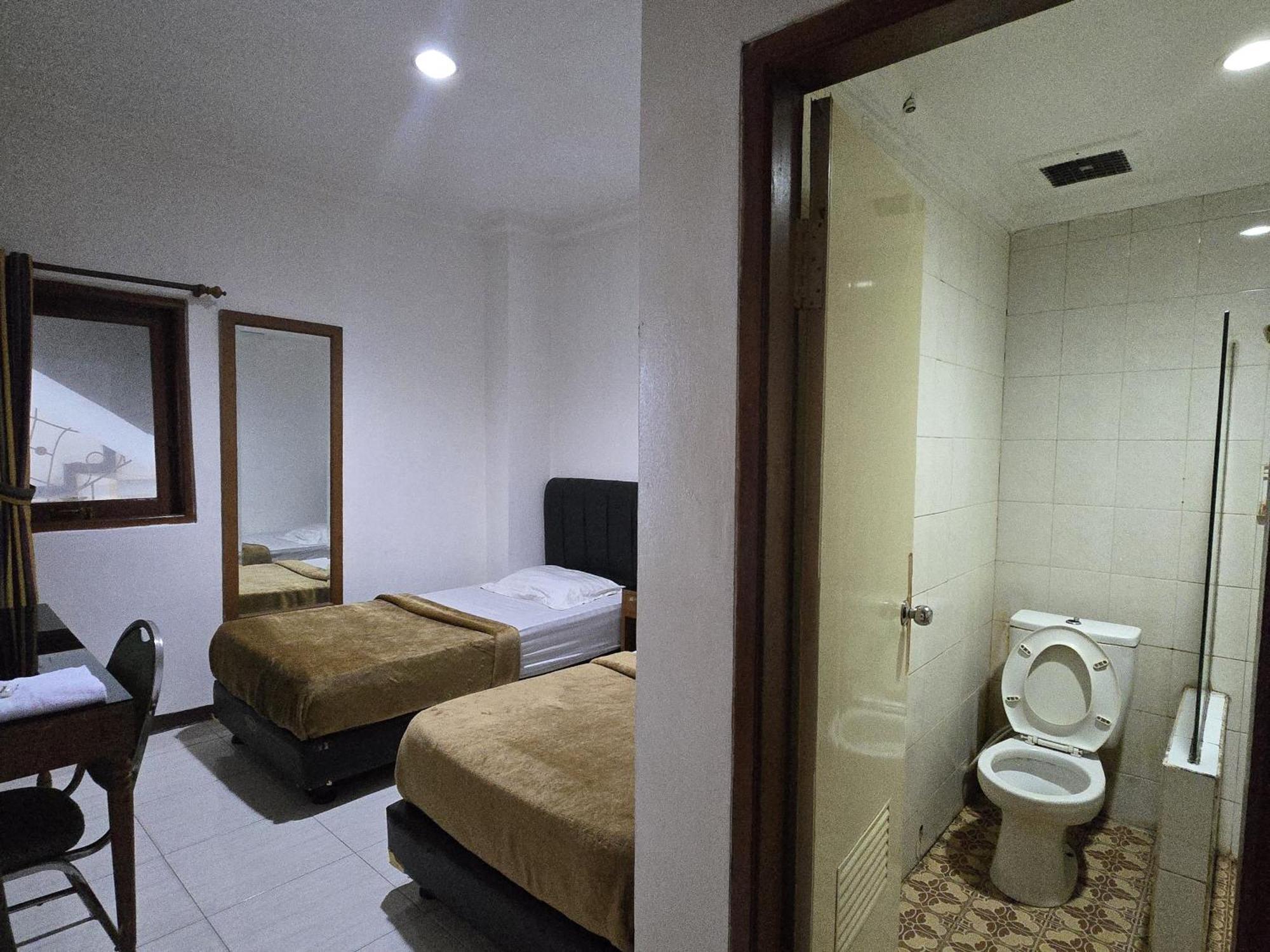 Hotel Maxim Kwitang Джакарта Номер фото
