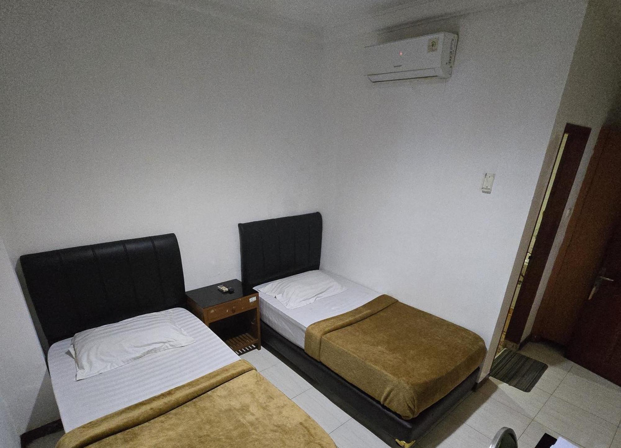 Hotel Maxim Kwitang Джакарта Номер фото