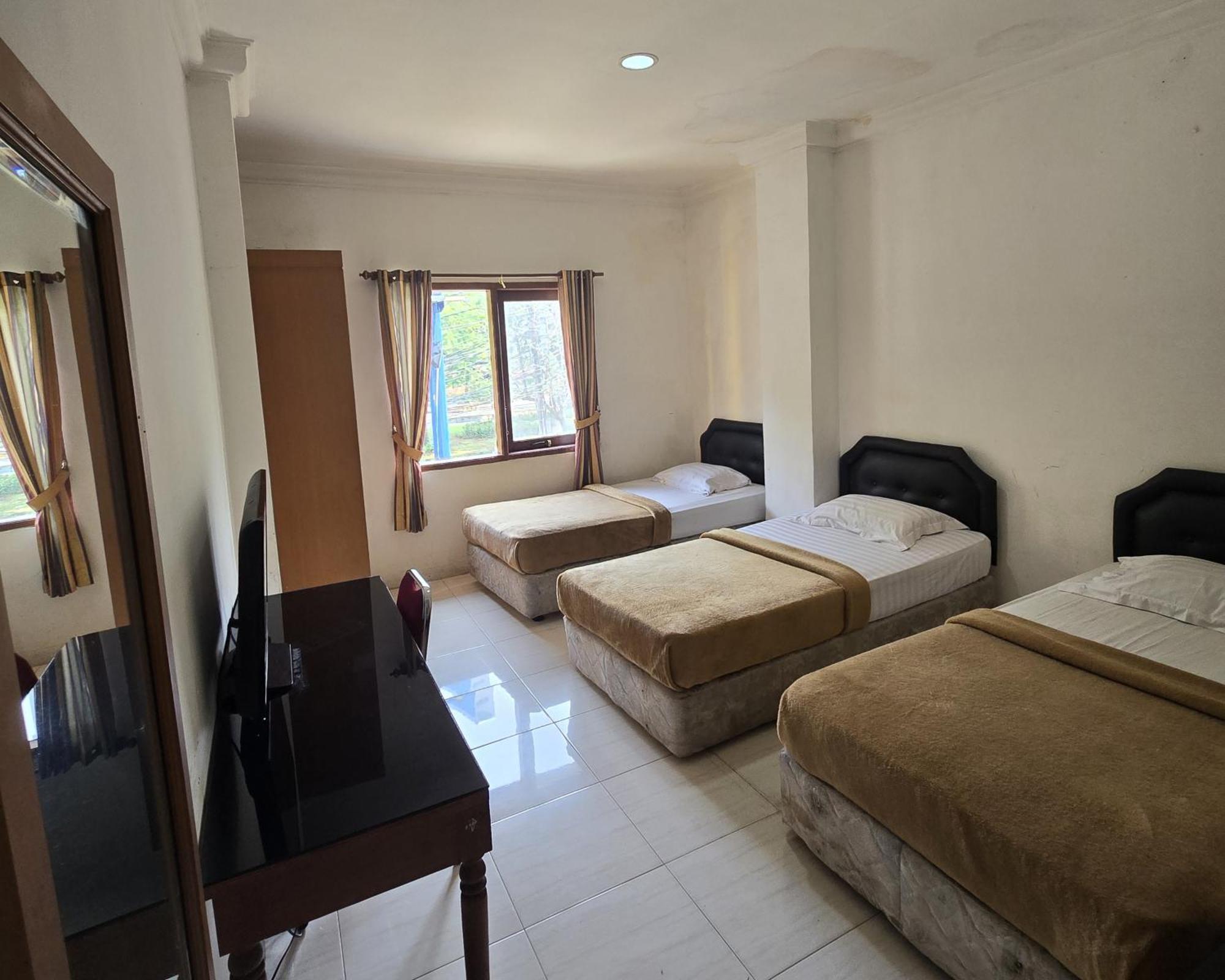 Hotel Maxim Kwitang Джакарта Номер фото